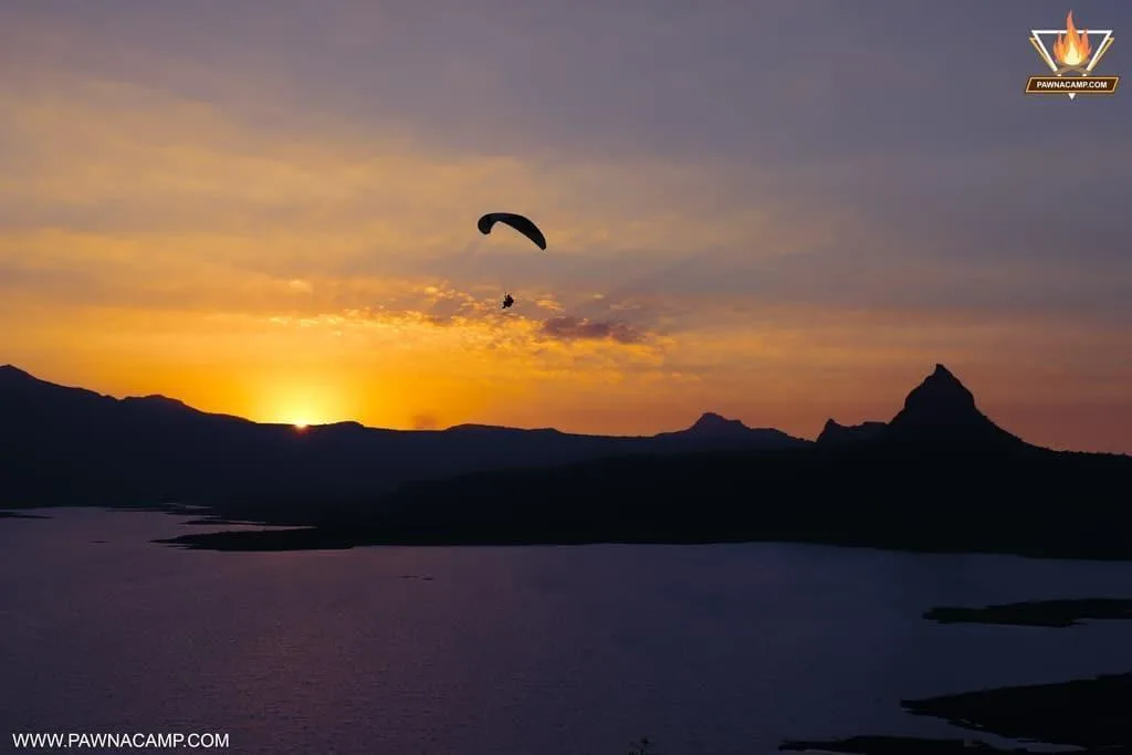 Pawna lake paragliding while sunset